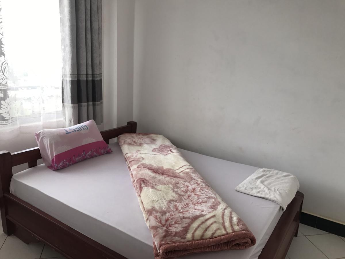 Hotel Dreamstone Moshi Habitación foto